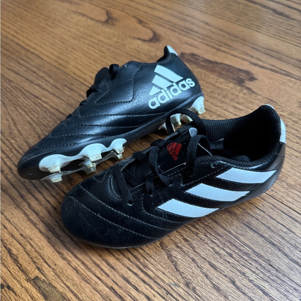 Adidas size 13 soccer cleats.